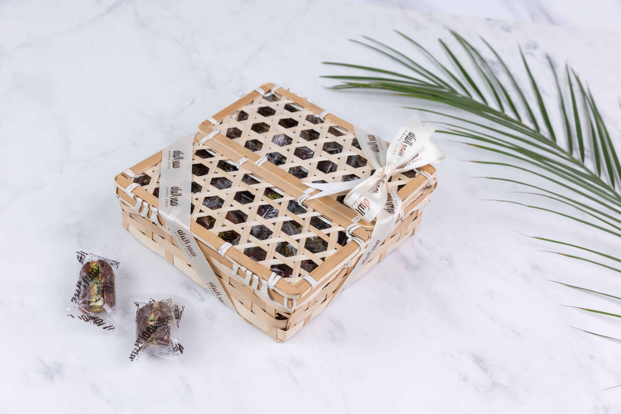 Gifting-Box-Bamboo-Square-Rose-Pistachio-Wrapped-Dates-810gm-scaled-2.jpg Rattan - الصورة 1