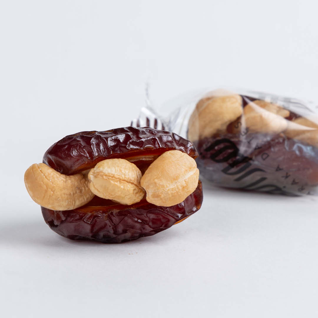 Wrapped-stuffed-dates4-1.jpg Medjool Cashew 3 Pcs Wrapped - Image 1